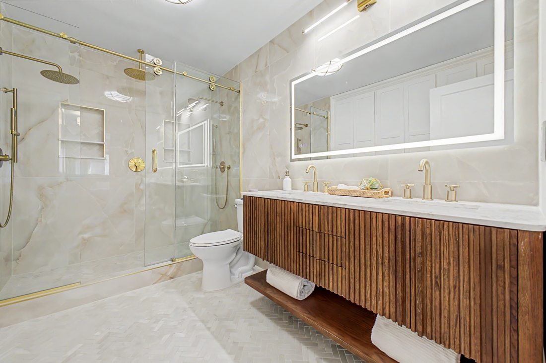 Primary bathroom remodel with tile and vanity in Denver