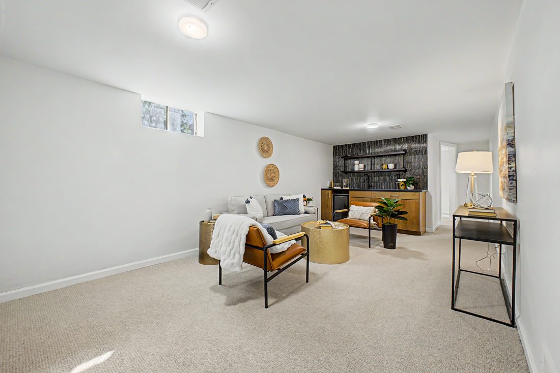 Finished basement living area in Denver