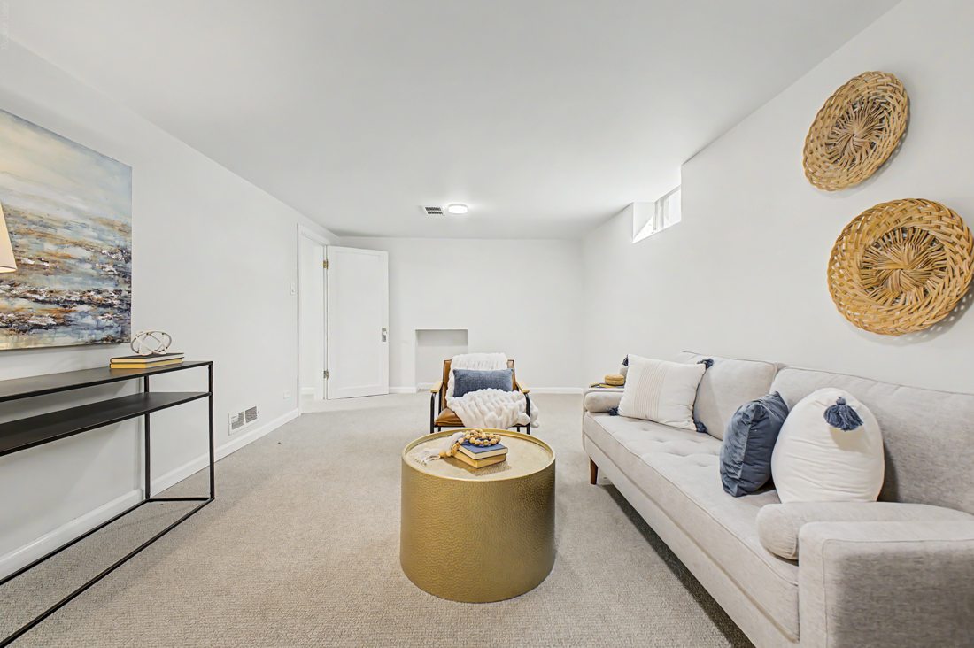Finished basement living area in Denver
