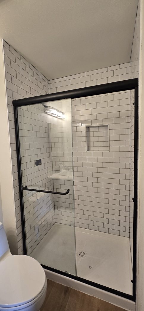 Glass shower with subway tile in Lakewood